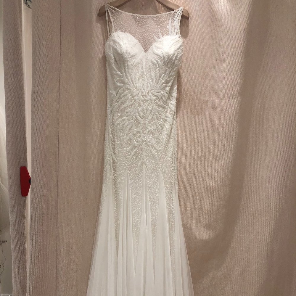 Fit and flare, illusion neckline, ivory, lots of beads
